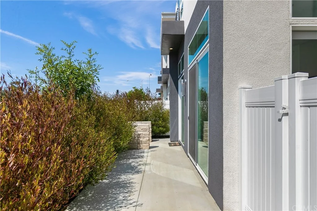2807 S El Camino Real · Side walkway