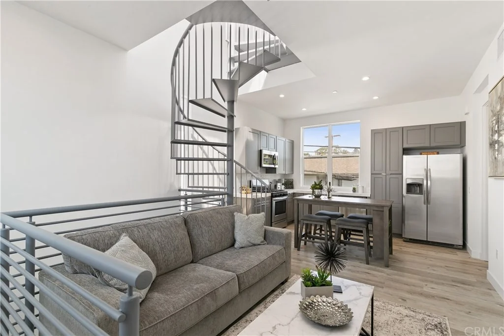 2807 S El Camino Real · Staircase and living area