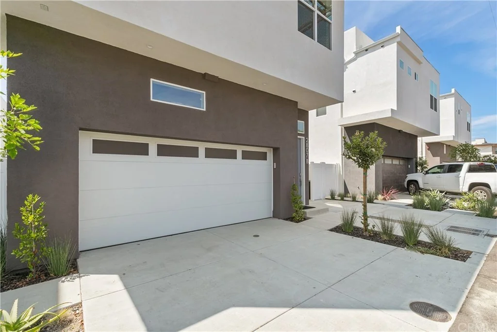 2807 S El Camino Real · Garage and rear exterior