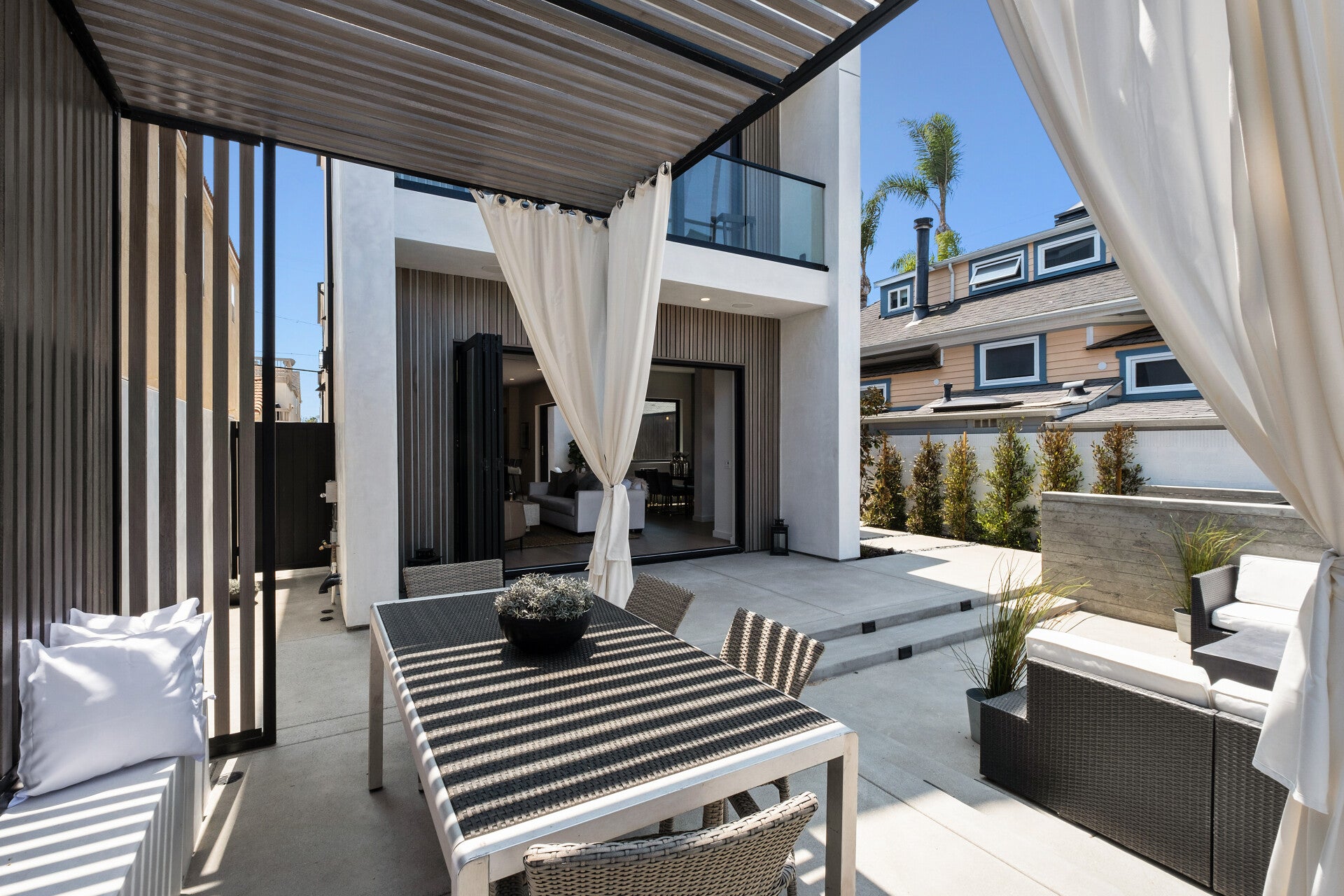 Tall covered outdoor cabana with seating