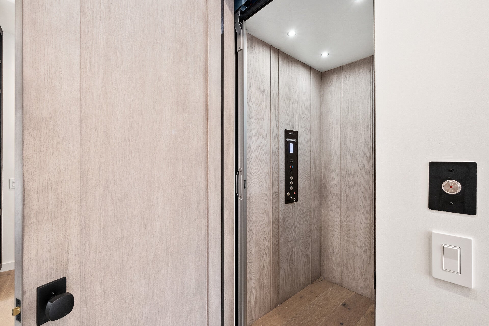 Wood-finished elevator cabin