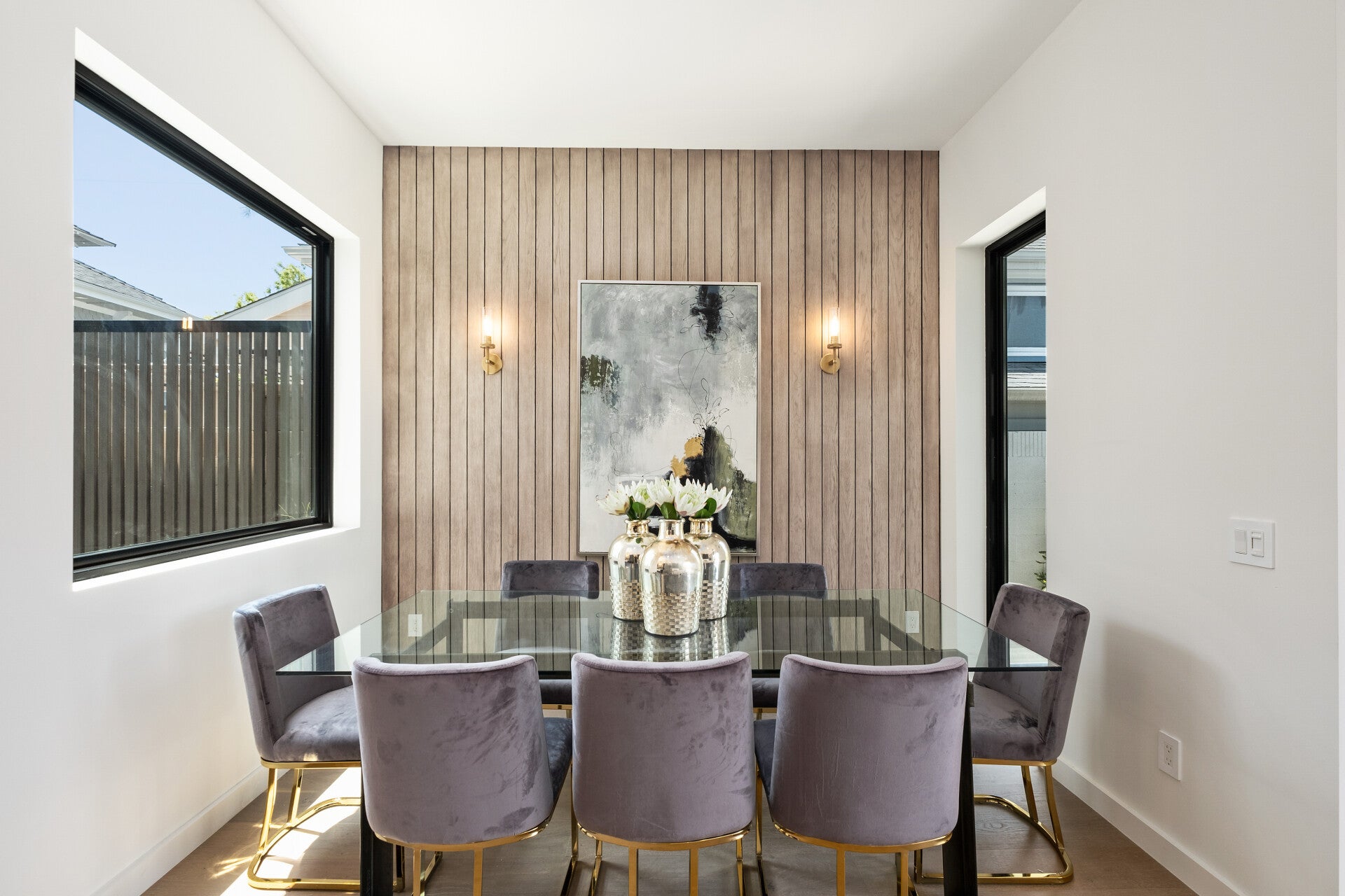 Dining space beside large windows